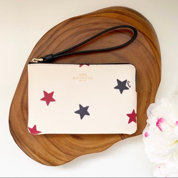 Coach Handbags - Coach Corner Zip Wristlet With Star Print
